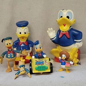 Donald Duck banks, Crane Service wind up car, Rubber figures